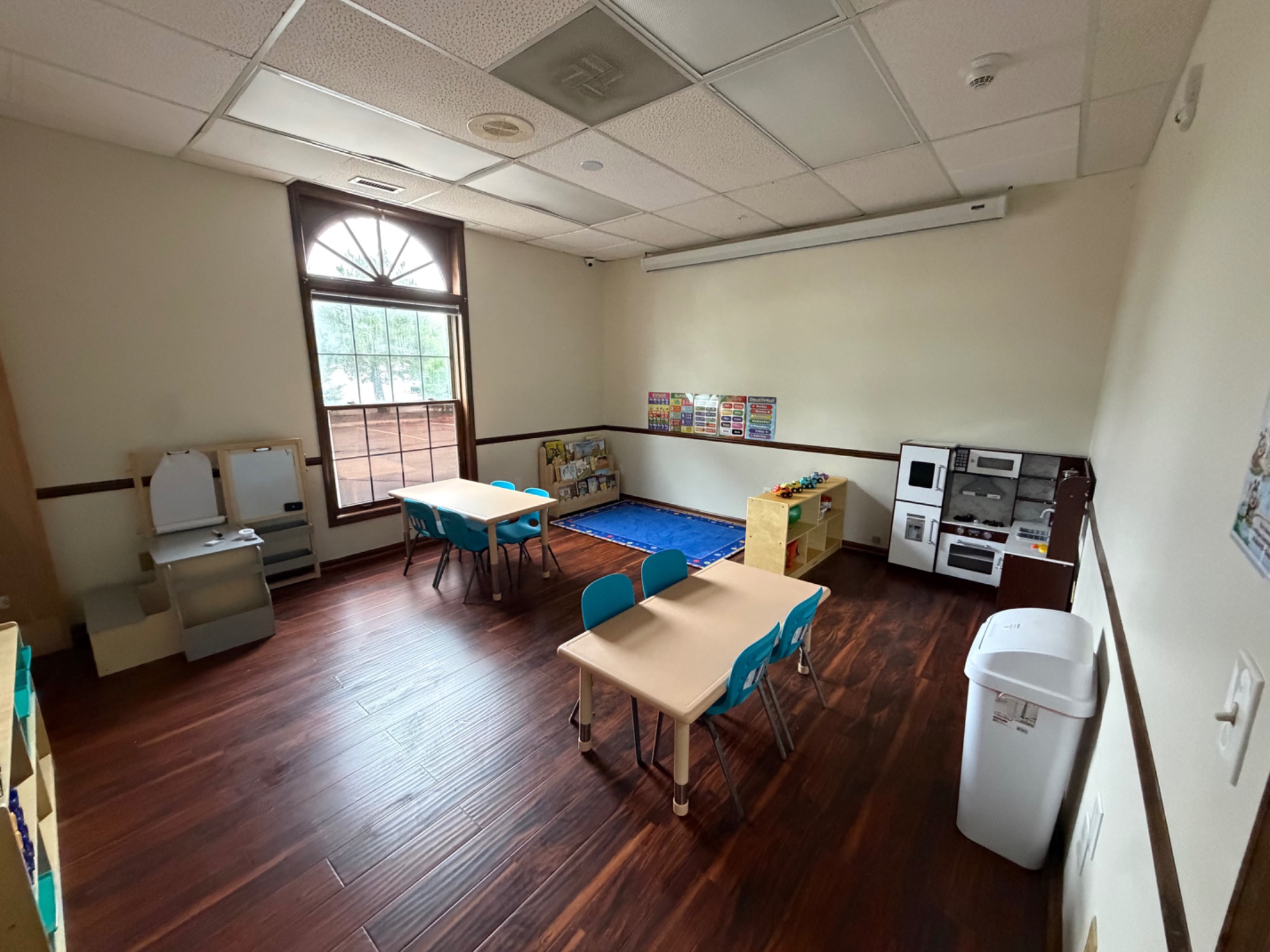 Classroom tables and dramatic play area